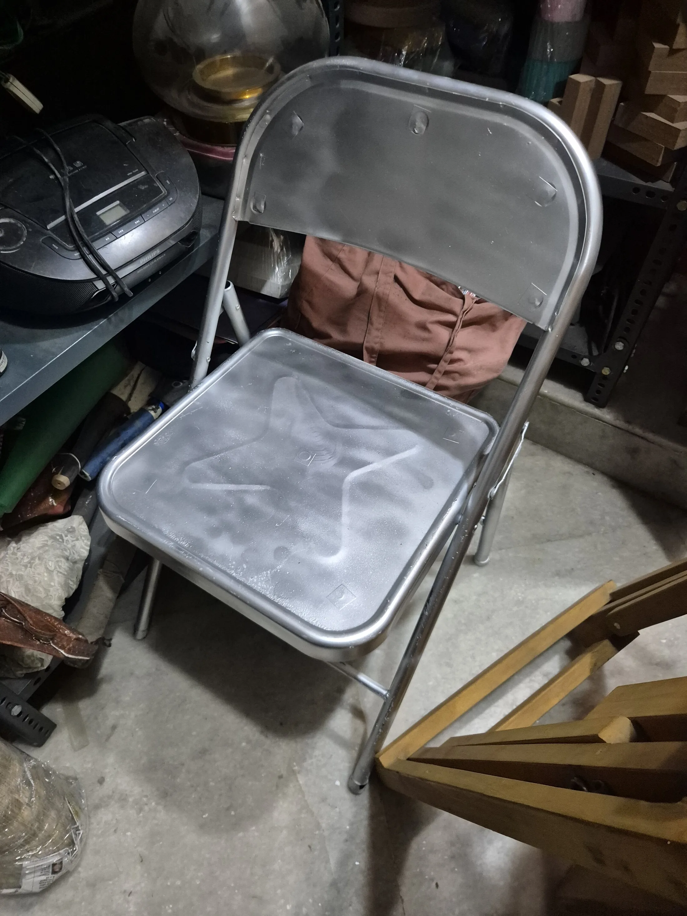 Brushed Steel Folding Chair — Furniture prop for rent in Delhi NCR