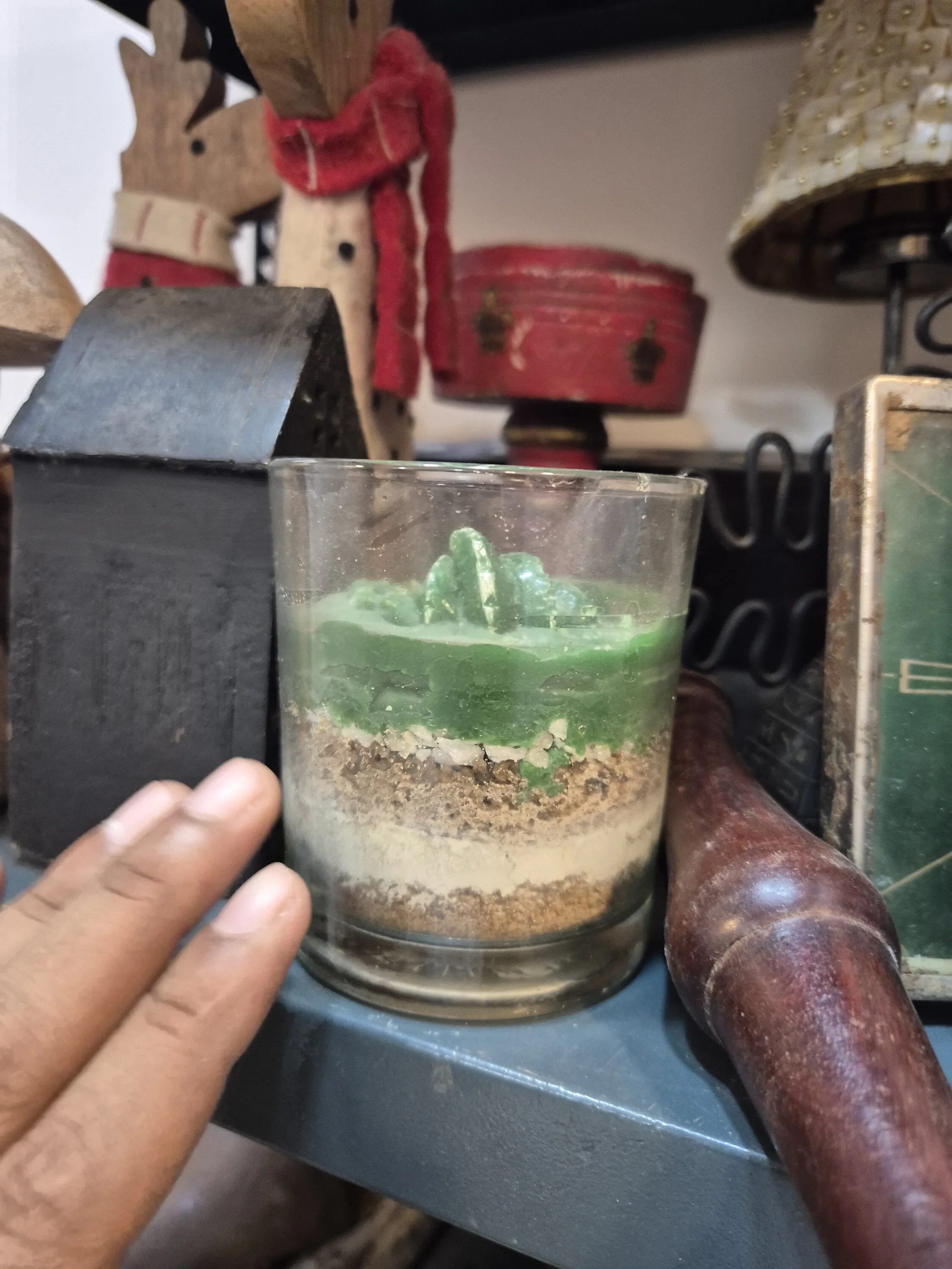 Green Layered Sand Candle in Glass Jar — Lighting prop for rent in Delhi NCR