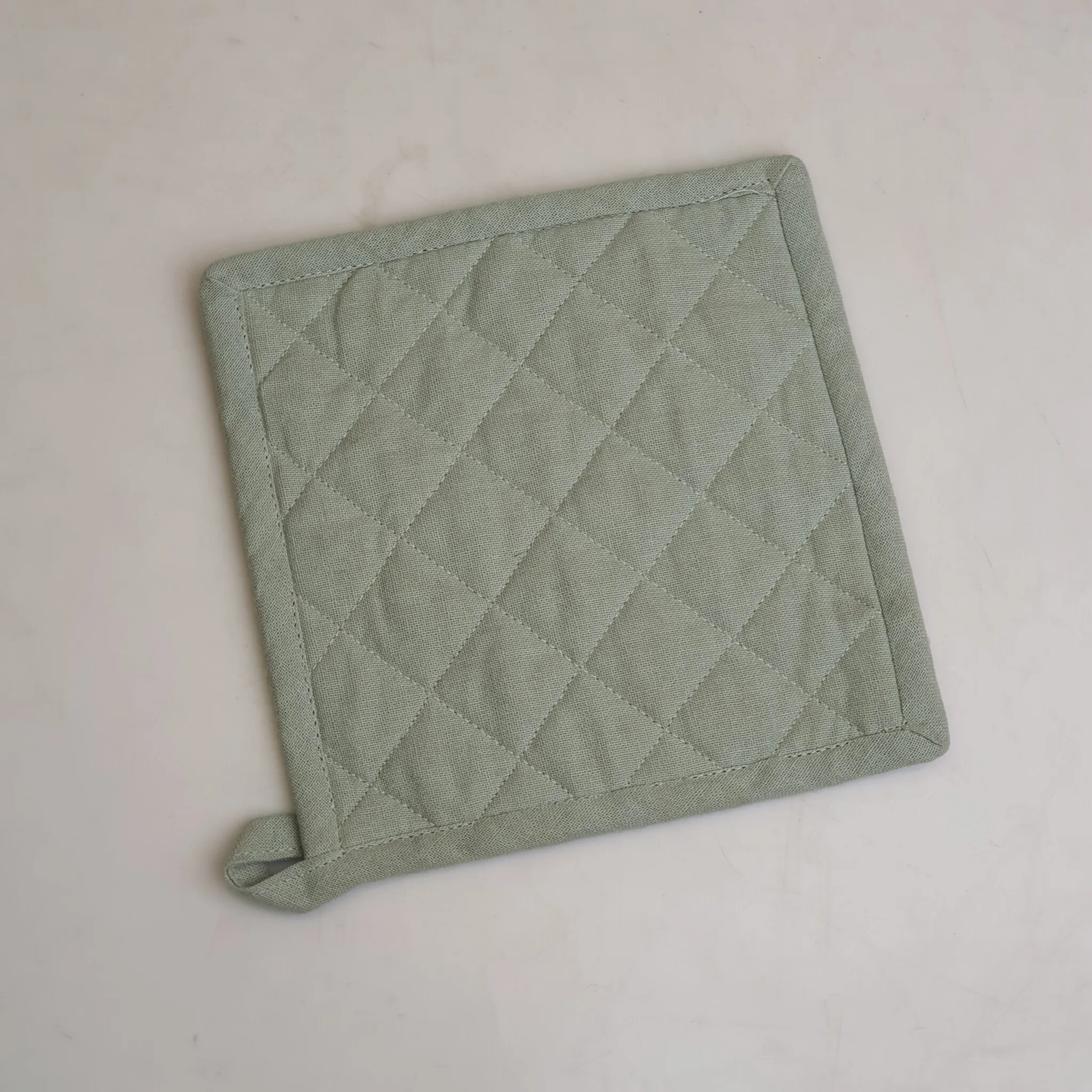 Sage Green Quilted Cotton Pot Holder — Kitchen and Dining prop for rent in Delhi NCR
