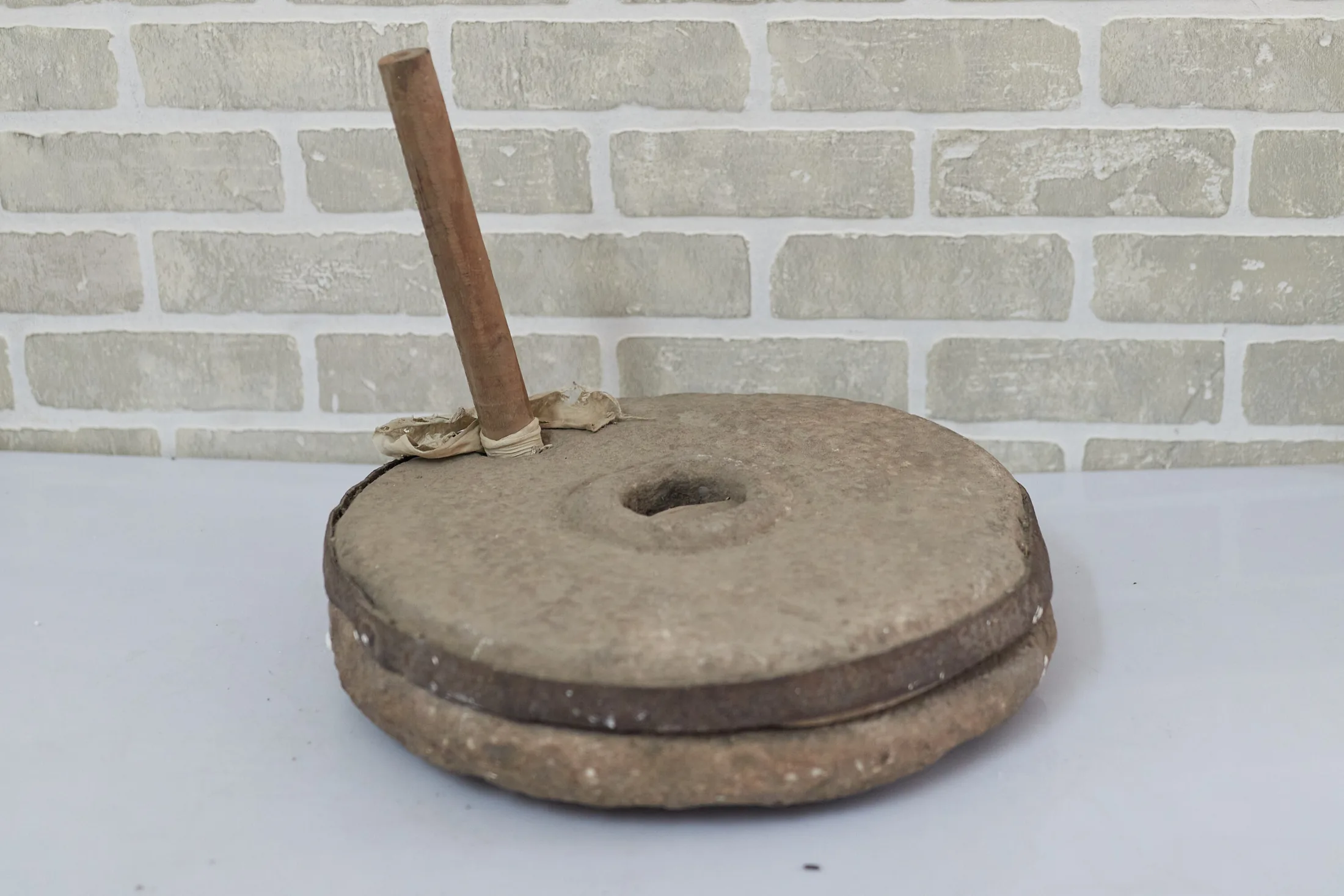 Stone Hand Grinding Mill With Wooden Handle — Kitchen and Dining prop for rent in Delhi NCR