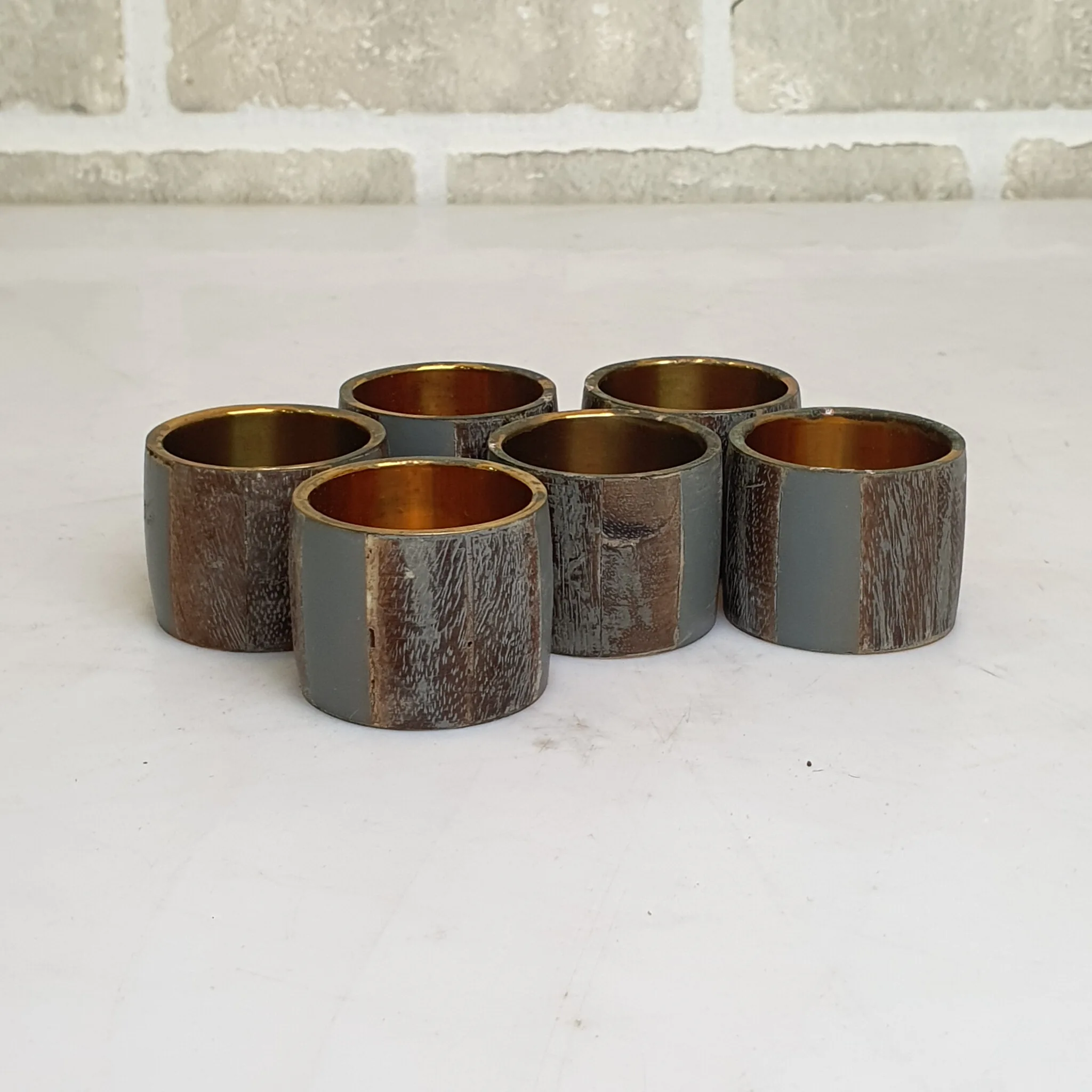 Grey Wood Napkin Rings With Brass Lining Set Of Six — Kitchen and Dining prop for rent in Delhi NCR