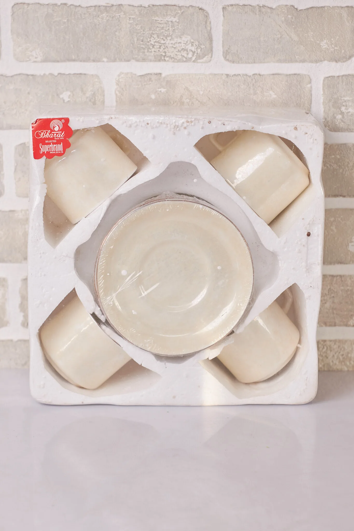 Cream Ceramic Cup And Saucer Set Boxed — Kitchen and Dining prop for rent in Delhi NCR