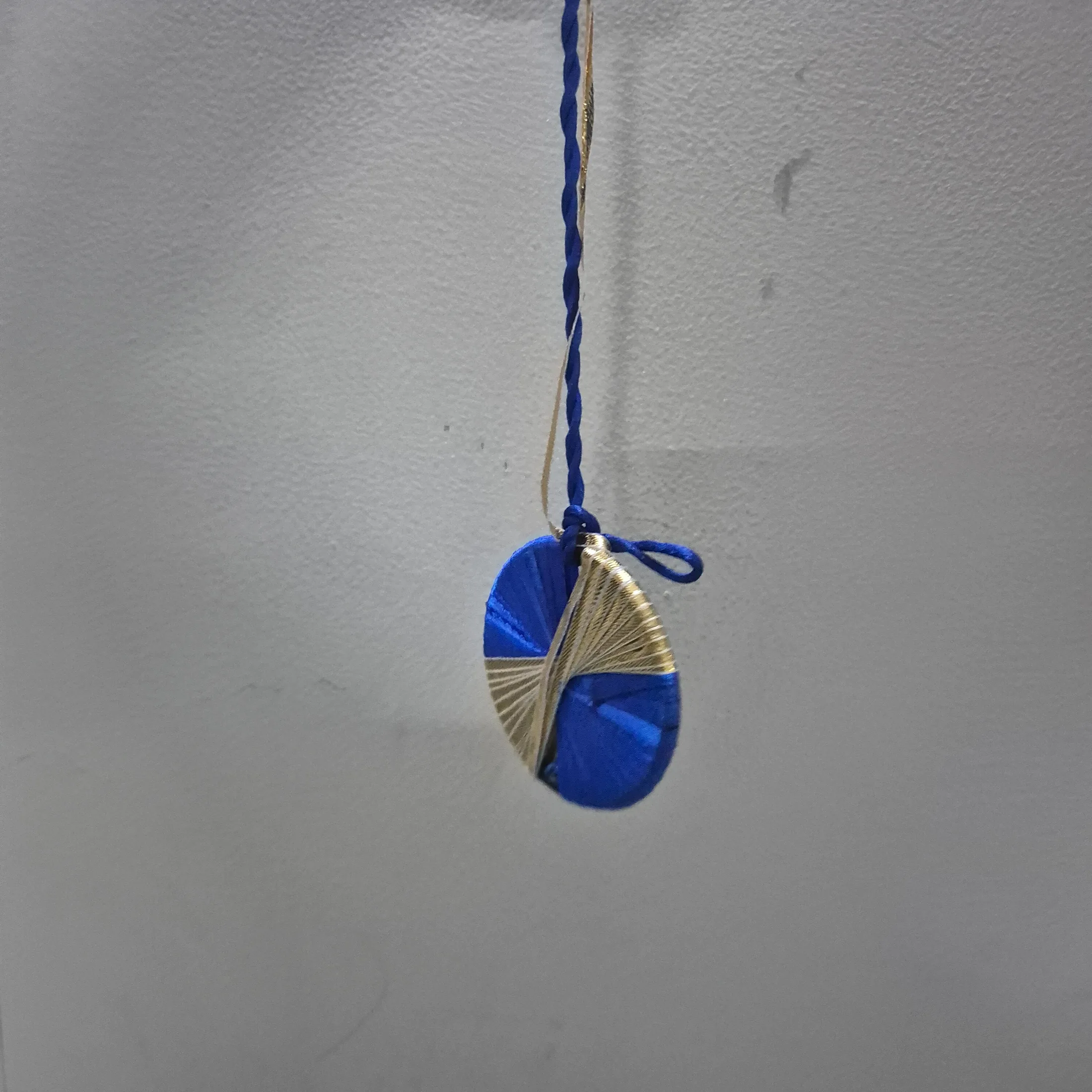 Blue and Gold Thread Disc Hanging Ornament — Wall Decor and Art prop for rent in Delhi NCR