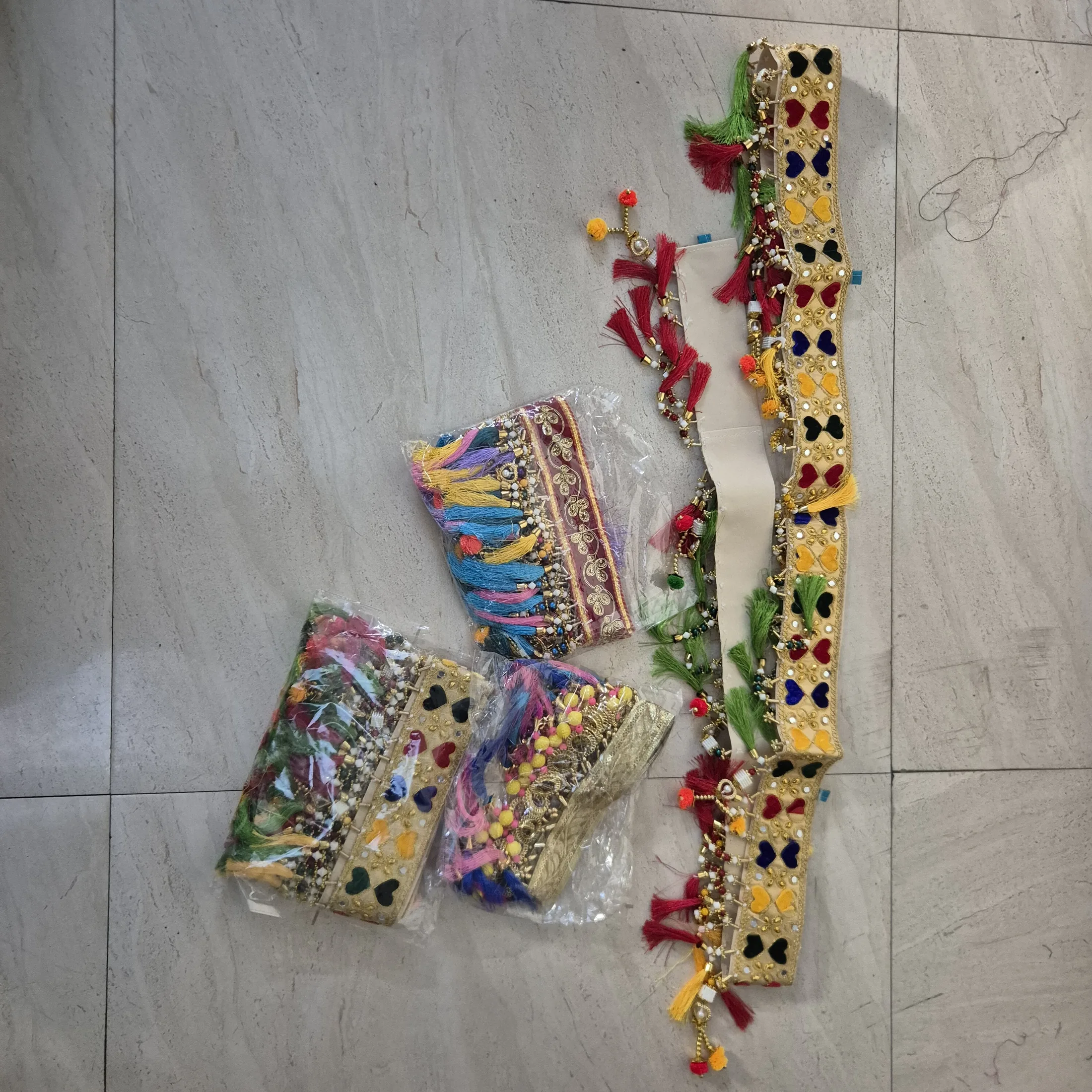 Embroidered Trim Borders with Pom Poms — Wall Decor and Art prop for rent in Delhi NCR