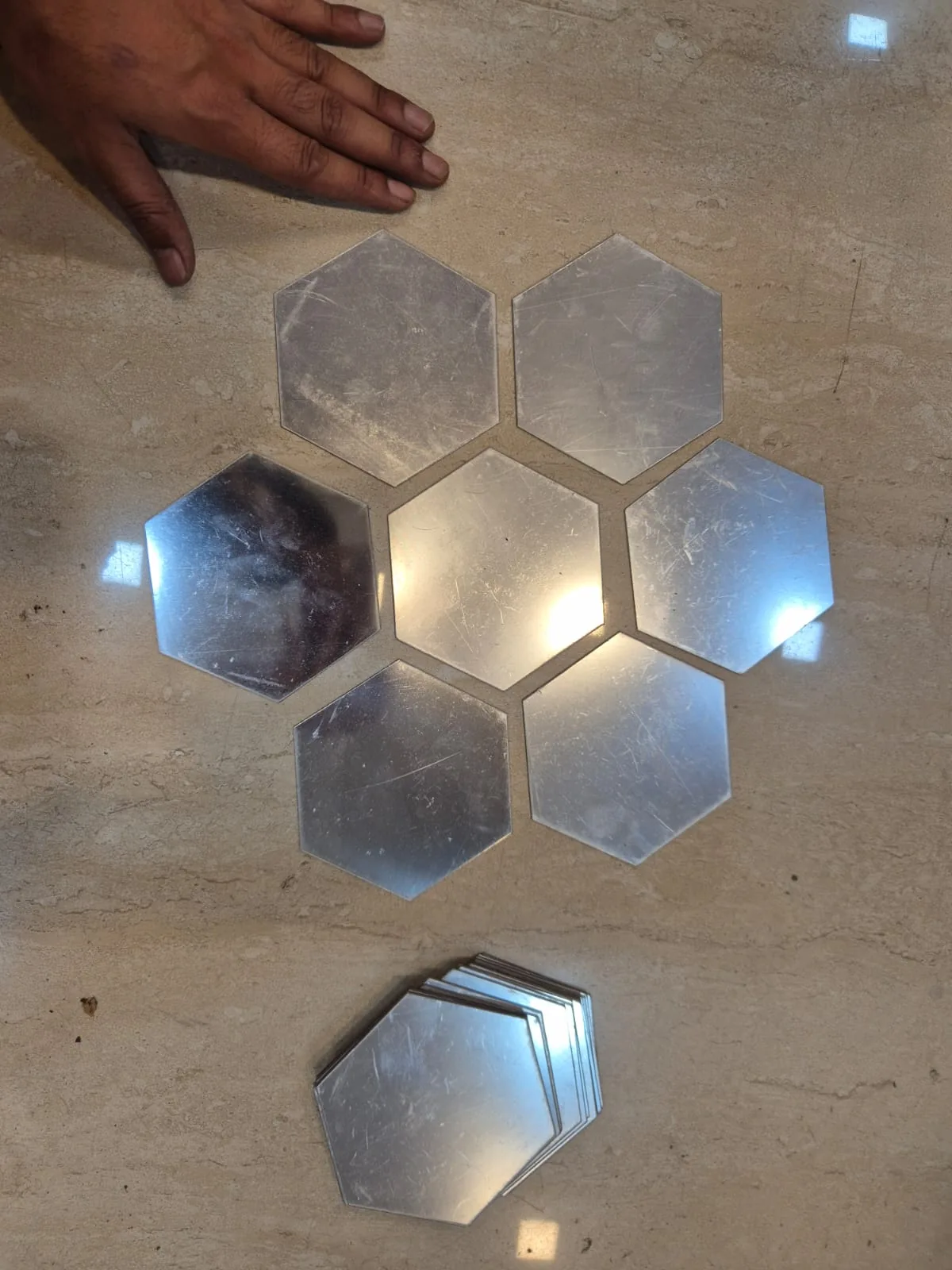 Silver Hexagonal Honeycomb Mirror Tile Set Seven — Wall Decor and Art prop for rent in Delhi NCR