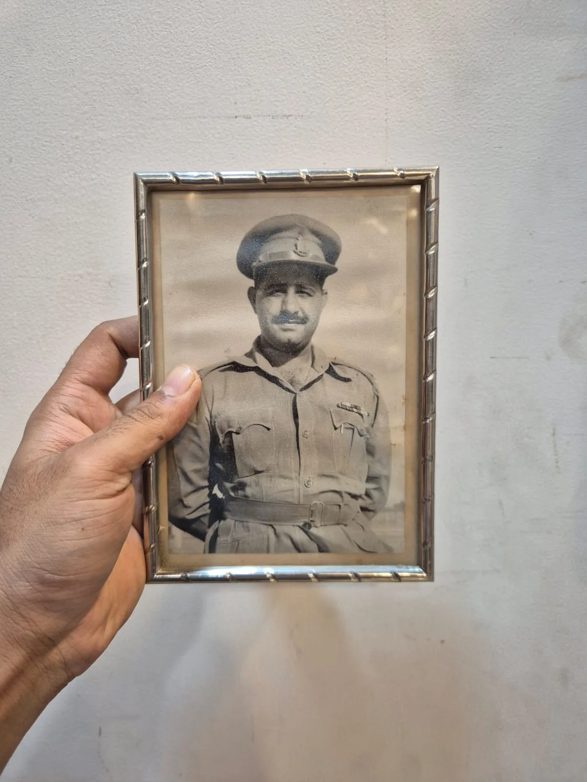 Vintage BW Army Officer Photo Silver Wave Pattern Frame — Wall Decor and Art prop for rent in Delhi NCR
