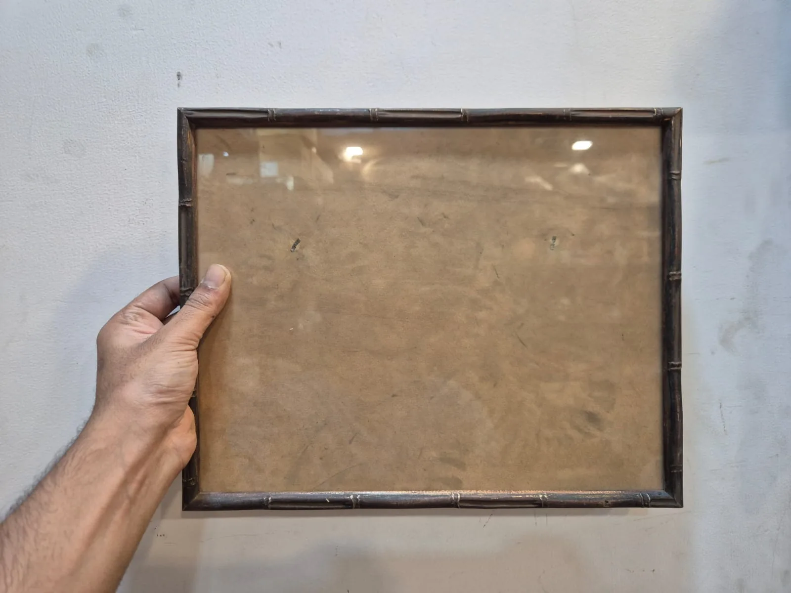 Empty Dark Wood Bamboo Style Photo Frame — Wall Decor and Art prop for rent in Delhi NCR
