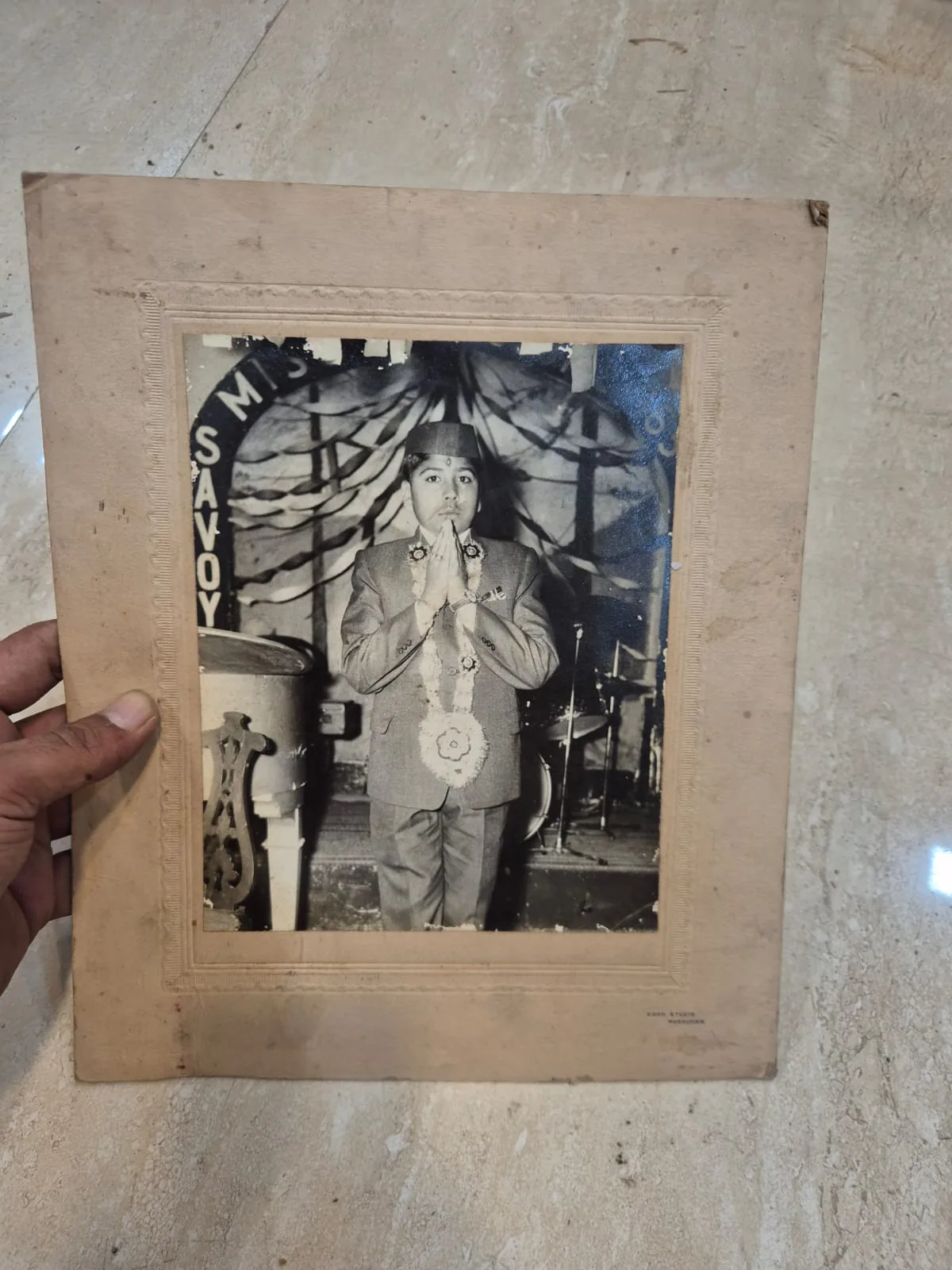 Vintage Sepia Man Garland Savoy Stage Printed Photograph — Wall Decor and Art prop for rent in Delhi NCR