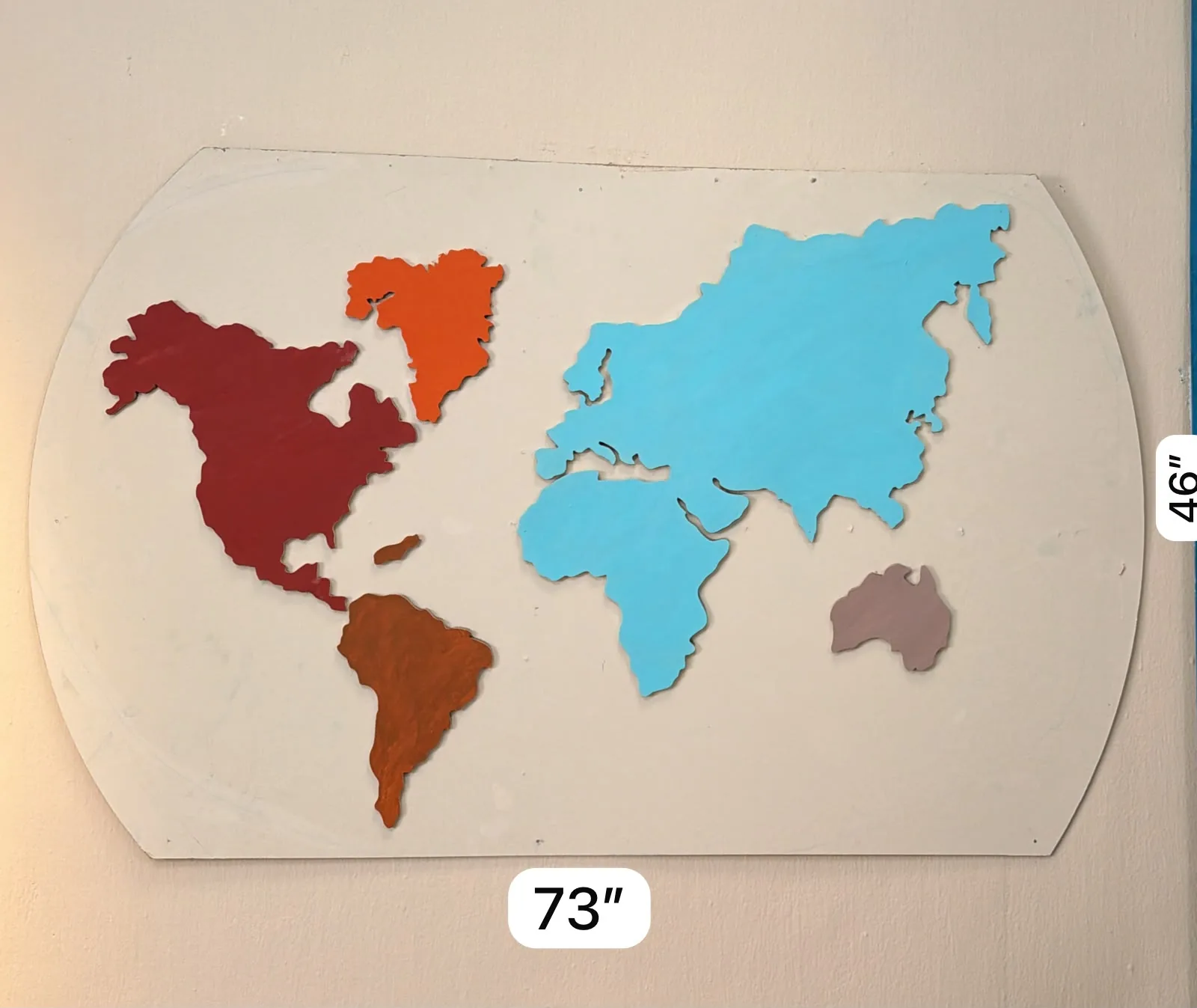 Large Wooden World Map Wall Art Cutout, Multicolor Continents — Wall Decor and Art prop for rent in Delhi NCR