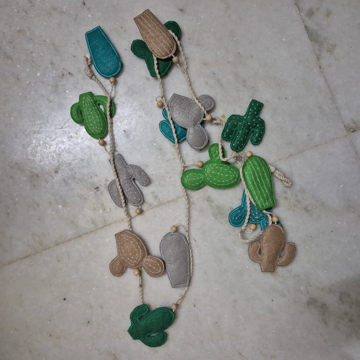 Multicolor Felt Cactus Shapes Hanging Garland With Beads — Wall Decor and Art prop for rent in Delhi NCR