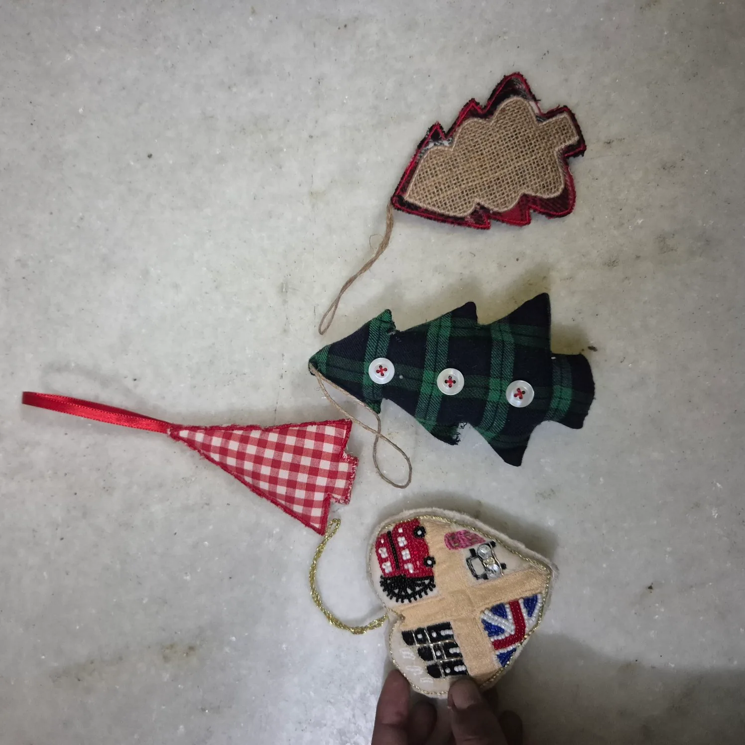 Set Of Assorted Fabric Christmas Tree And Bus Ornaments — Wall Decor and Art prop for rent in Delhi NCR