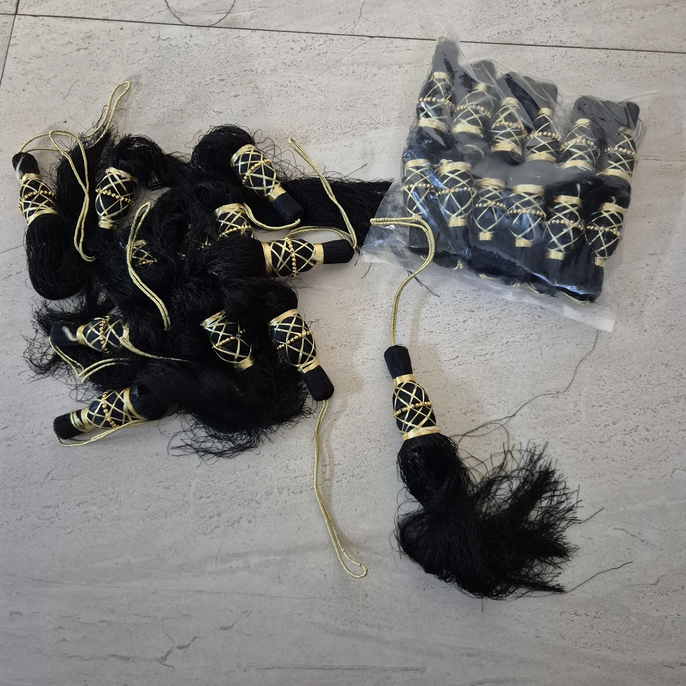 Black Cord Tassels with Gold Binding — Wall Decor and Art prop for rent in Delhi NCR