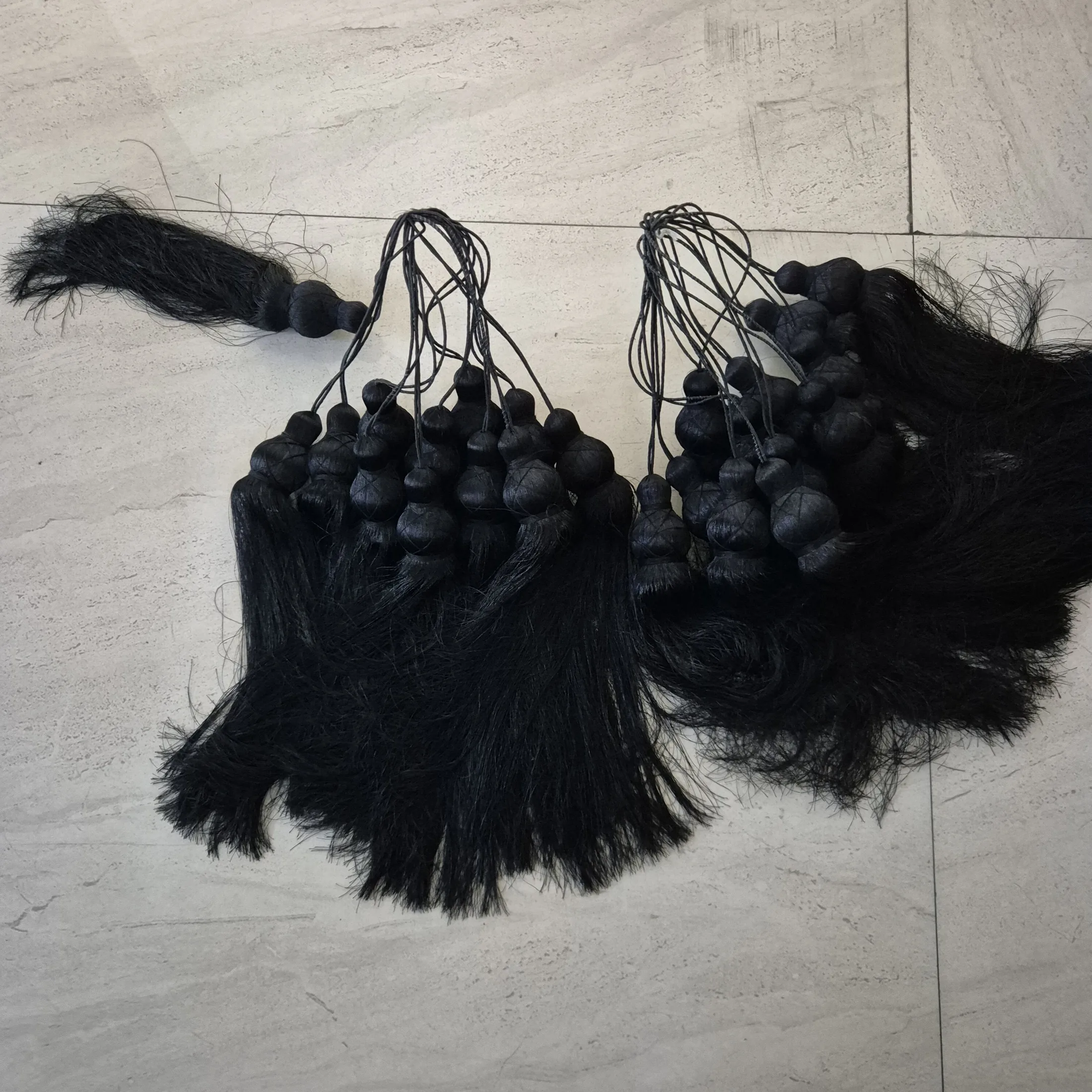 Black Silk Tassel Bunches with Bead Tops — Wall Decor and Art prop for rent in Delhi NCR