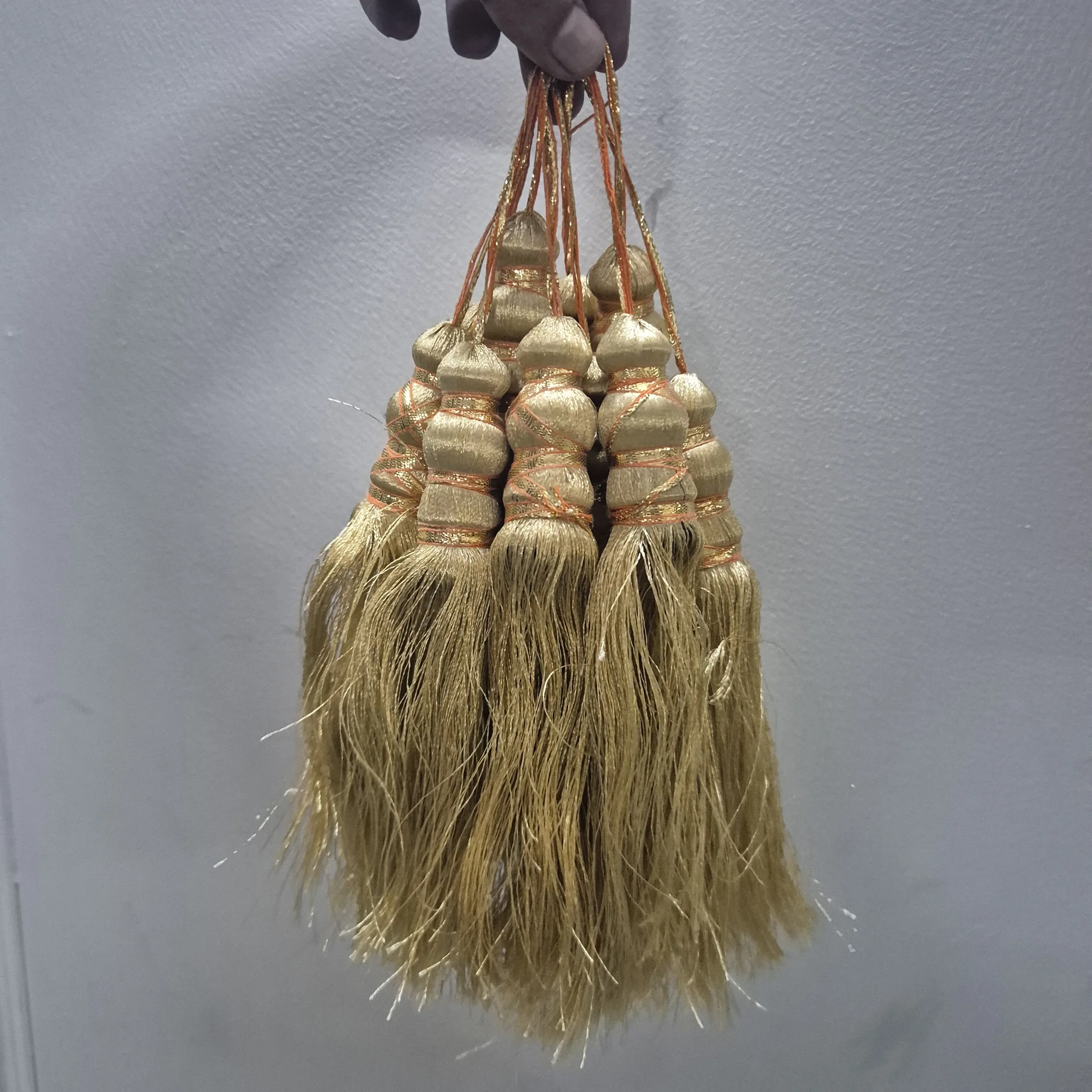Gold Silk Tassel Bunch with Beaded Tops — Wall Decor and Art prop for rent in Delhi NCR