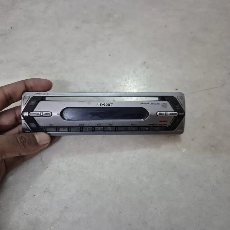 Vintage Silver Sony MP3 CD Car Stereo Detachable Faceplate — Tech and Electronics prop for rent in Delhi NCR