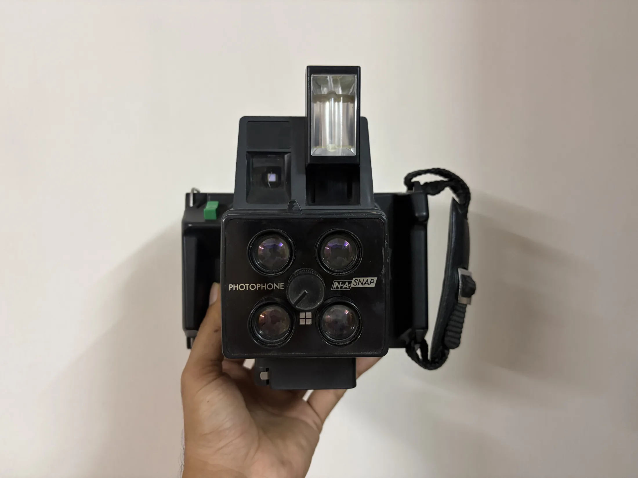 Black Vintage Instant Camera with Four Lenses — Tech and Electronics prop for rent in Delhi NCR