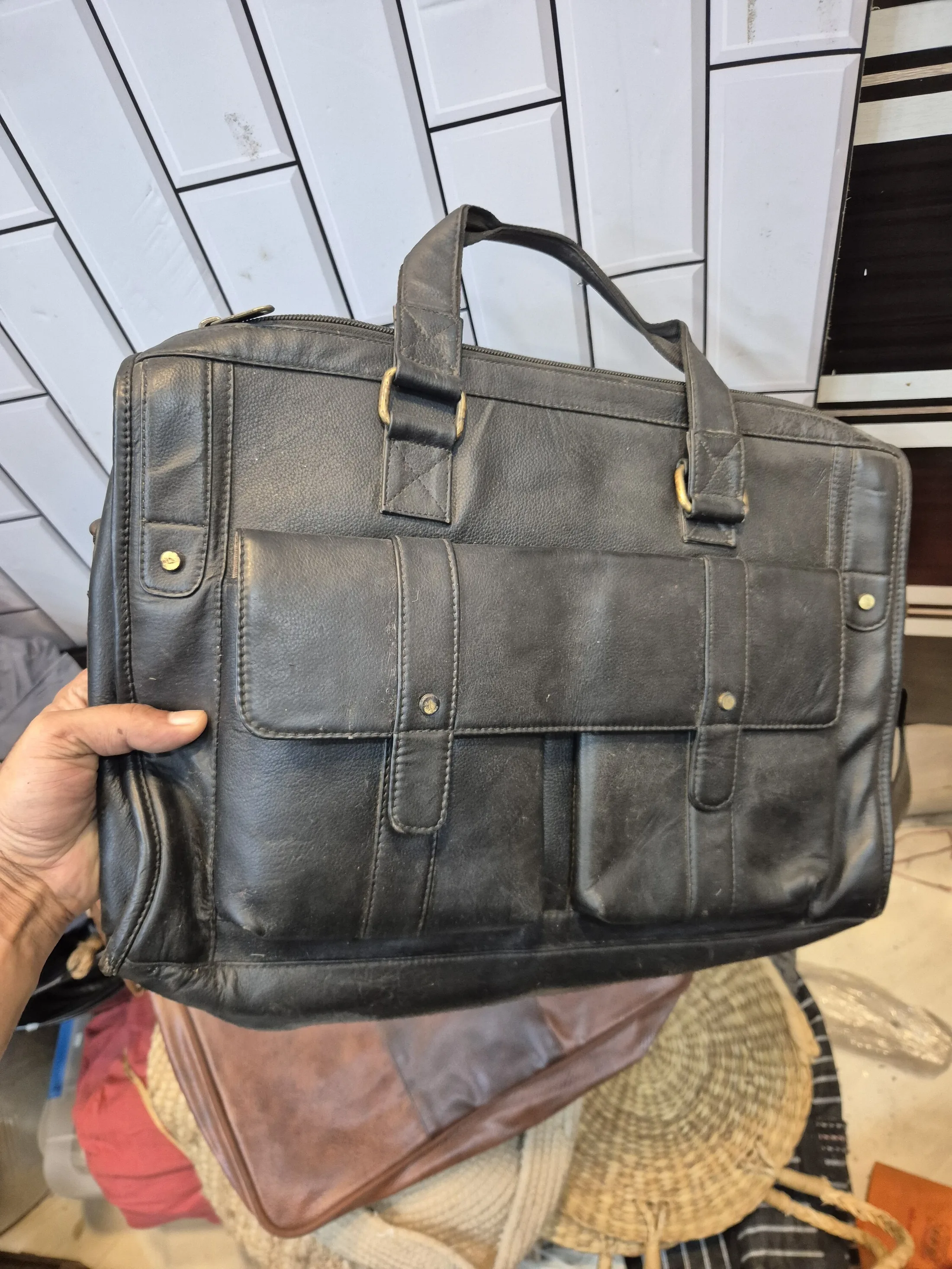 Black Leather Messenger Briefcase Bag — Fashion and Accessories prop for rent in Delhi NCR