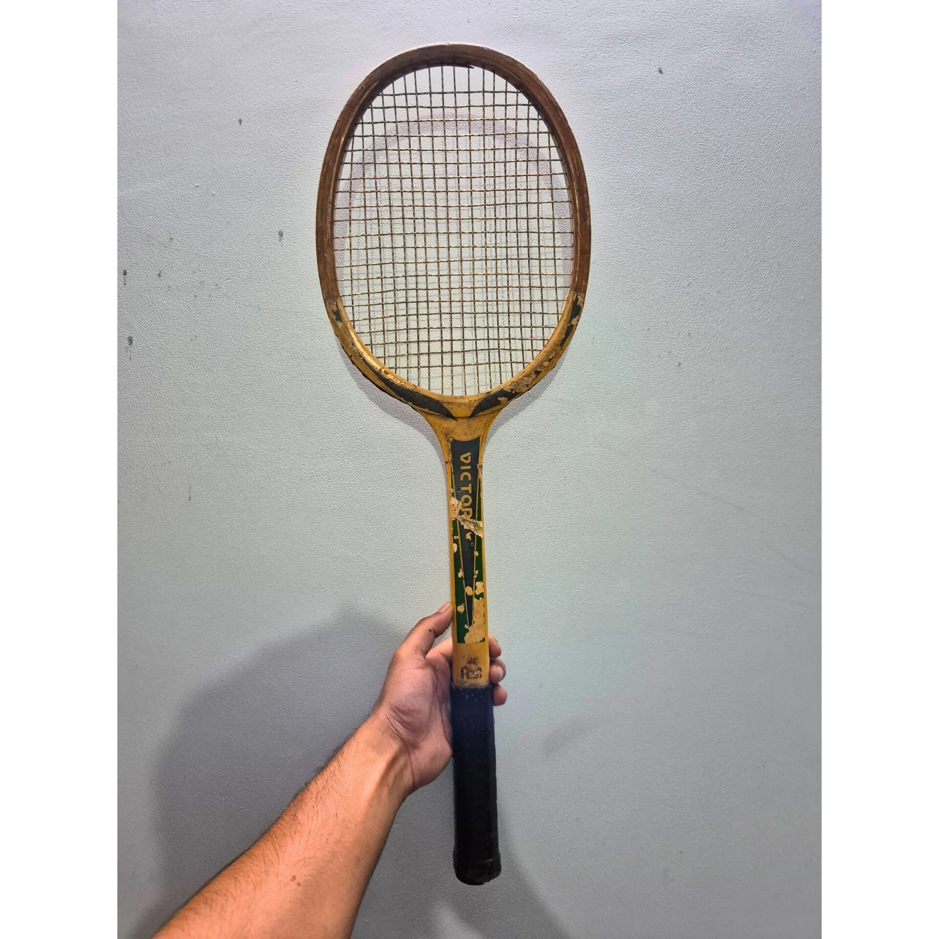 Vintage Wooden Tennis Racket Yellow Frame — Sports and Outdoors prop for rent in Delhi NCR