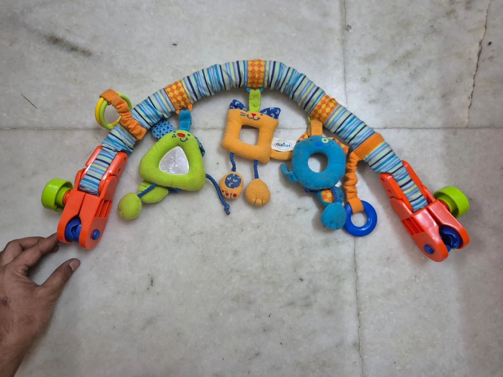 Multicolor Striped Baby Stroller Arch Sensory Hanging Toy — Toys and Games prop for rent in Delhi NCR