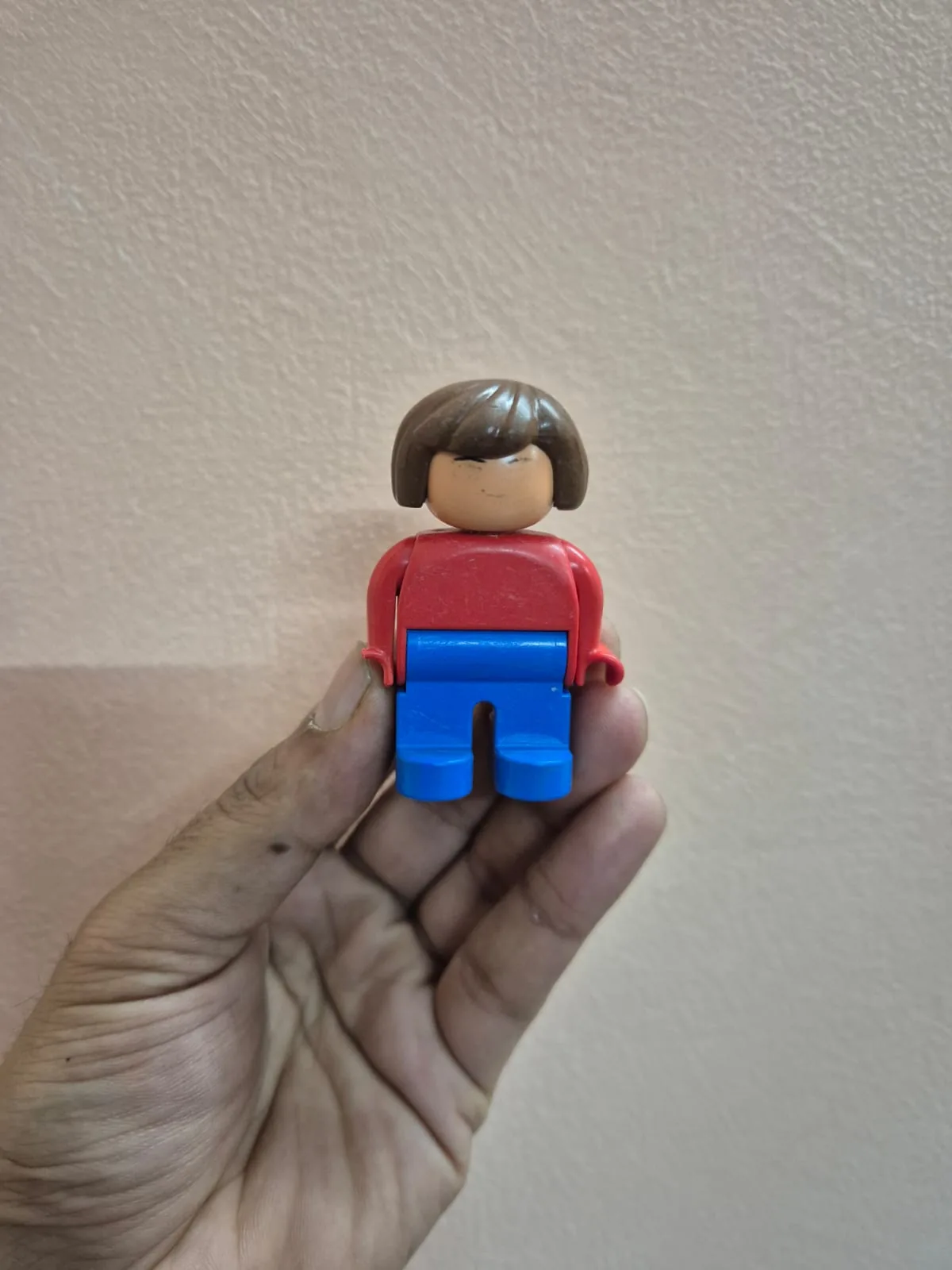 Vintage Lego Duplo Woman Figure Red Shirt Blue Pants — Toys and Games prop for rent in Delhi NCR
