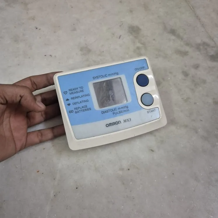 Omron MX3 Blue White Wrist Blood Pressure Monitor — Science and Medical prop for rent in Delhi NCR