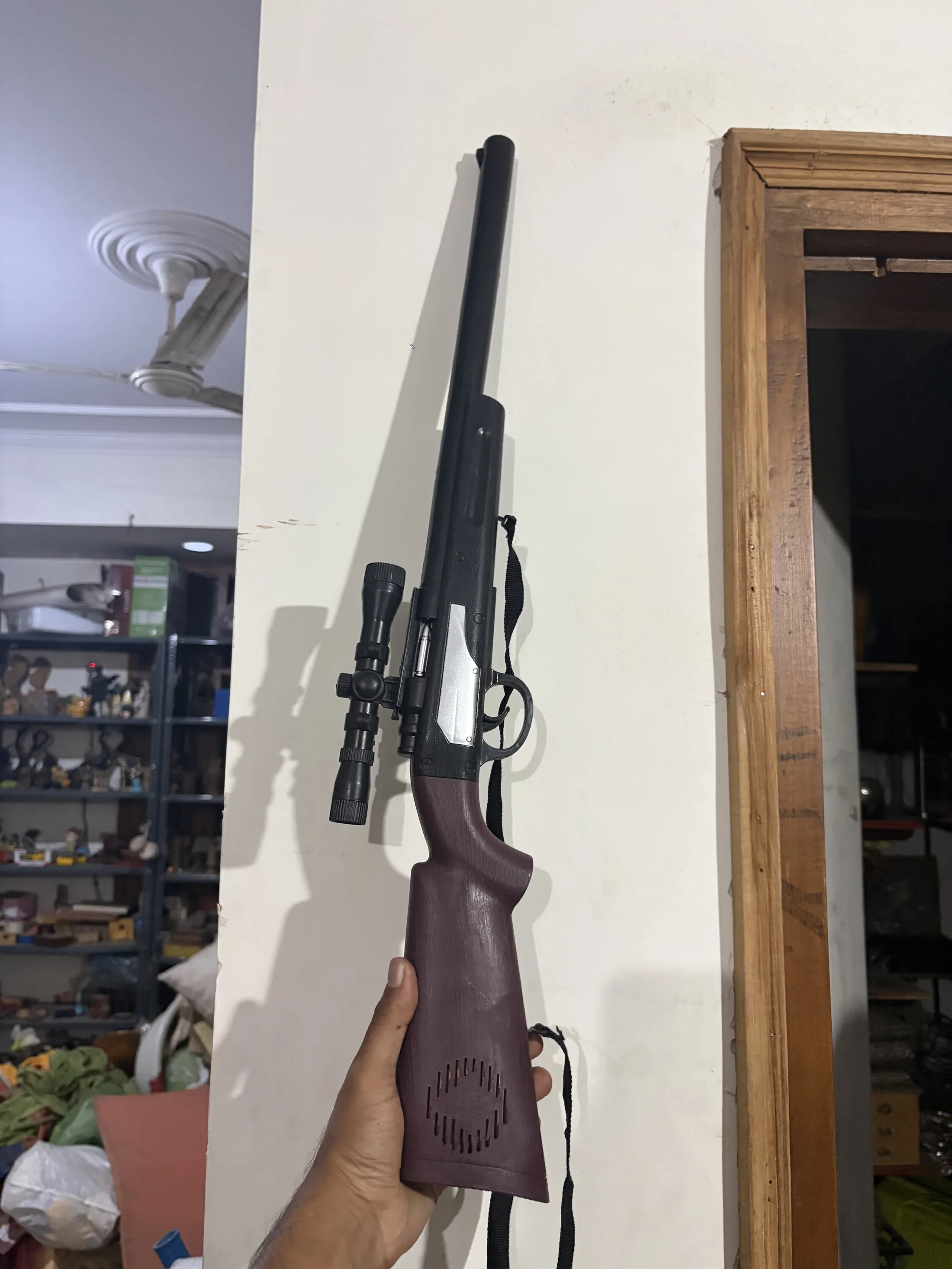 Maroon Black Plastic Toy Rifle with Scope — Weapons and Tactical prop for rent in Delhi NCR